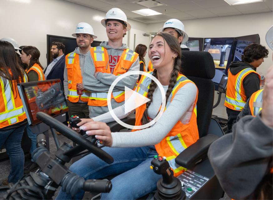 Students using machines while on a field trip